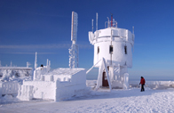 Mount Washington Observatory's extensive weather station, covered in ice and snow